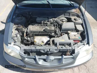 2001 Hyundai Accent GLS z VIN KMHCG35C01U136132, wystawiony jako IAAI lot #42293830 z przebiegiem 111 906 mil mil oraz . Historia ofert i sprzedaży dostępna na DreamBid. Obrazek 10.