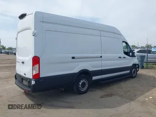 2022 Ford Transit Cargo with VIN 1FTBW3XG9NKA84214, listed as a IAAI auction lot 42033413 with 6,746 mi miles and . Bid and sale history available at DreamBid. Image 4.