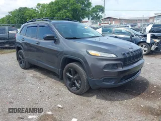 2016 Jeep Cherokee Altitude with VIN 1C4PJLAS1GW330198, listed as a IAAI auction lot 42523156 with 119,930 mi miles and . Bid and sale history available at DreamBid. Image 1.