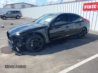 2014 Infiniti Q50 Hybrid Premium with VIN JN1AV7AP8EM691436, listed as a IAAI auction lot 42138263 with 93,253 mi miles and . Bid and sale history available at DreamBid. Image 2.