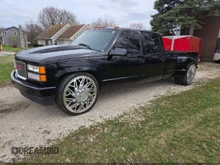 1997 GMC Sierra 3500 z VIN 1GTHC33J5VF005375, wystawiony jako IAAI lot #42298688 z przebiegiem 188 825 mil mil oraz . Historia ofert i sprzedaży dostępna na DreamBid. Obrazek 2.