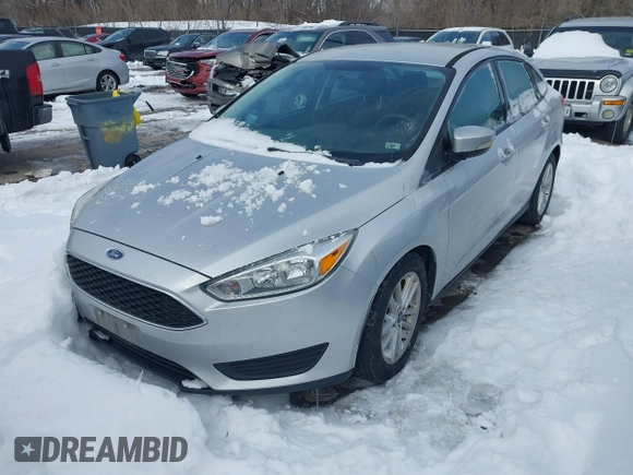 2015 Ford Focus SE z VIN 1FADP3F26FL357140, wystawiony jako IAAI lot #41256854 z przebiegiem 194 812 mil mil oraz . Historia ofert i sprzedaży dostępna na DreamBid. Obrazek 2.