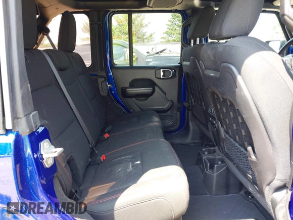 2018 Jeep Wrangler Unlimited Rubicon with VIN 1C4HJXFG8JW184793, listed as a IAAI auction lot 42429098 with 86,580 mi miles and . Bid and sale history available at DreamBid. Image 8.