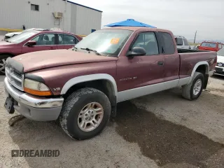 2001 Dodge Dakota Sport z VIN 1B7GG22N81S152399, wystawiony jako Copart lot #58543135 z przebiegiem 218 133 mil mil oraz Szkoda całkowita • Salvage title. Historia ofert i sprzedaży dostępna na DreamBid. Obrazek 1.