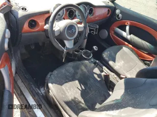 2005 MINI Convertible z VIN WMWRF33585TF62541, wystawiony jako Copart lot #49868625 z przebiegiem Nie podano mil oraz Szkoda całkowita • Salvage title. Historia ofert i sprzedaży dostępna na DreamBid. Obrazek 8.