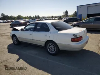 1996 Toyota Camry LE z VIN JT2BF12K3T0139807, wystawiony jako Copart lot #57675855 z przebiegiem 258 601 mil mil oraz Szkoda całkowita • Salvage title. Historia ofert i sprzedaży dostępna na DreamBid. Obrazek 2.