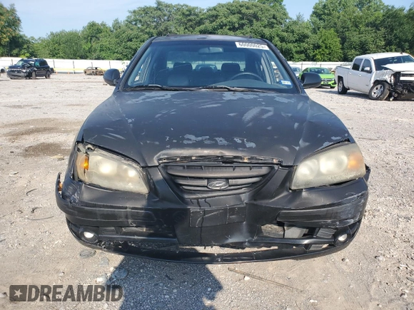 2004 Hyundai Elantra GLS z VIN KMHDN46D94U917890, wystawiony jako Copart lot #60000025 z przebiegiem 158 474 mil mil oraz Czysty tytuł • Clean title. Historia ofert i sprzedaży dostępna na DreamBid. Obrazek 5.