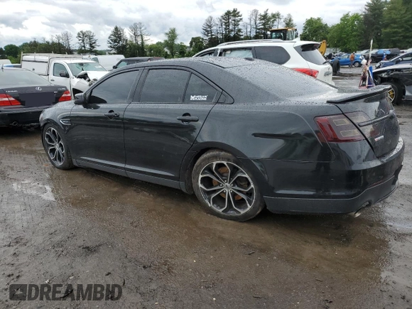 2014 Ford Taurus SHO with VIN 1FAHP2KTXEG167682, listed as a Copart auction lot 57882625 with 173,424 mi miles and Salvage title. Bid and sale history available at DreamBid. Image 2.