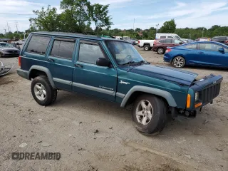1998 Jeep Cherokee Sport z VIN 1J4FJ68S4WL101110, wystawiony jako Copart lot #57696755 z przebiegiem 218 254 mil mil oraz Szkoda całkowita • Salvage title. Historia ofert i sprzedaży dostępna na DreamBid. Obrazek 4.