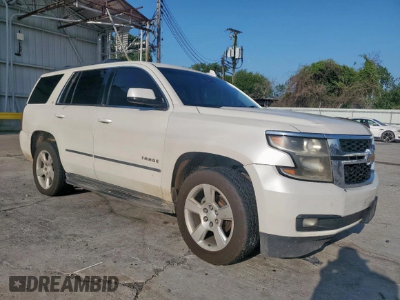 2015 Chevrolet Tahoe LT with VIN 1GNSCBKC1FR714895, listed as a Copart auction lot 60787185 with 239,815 mi miles and Salvage title. Bid and sale history available at DreamBid. Image 4.