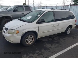 2003 Dodge Caravan Sport z VIN 2D4GP44L43R236945, wystawiony jako IAAI lot #41798386 z przebiegiem 143 904 mil mil oraz . Historia ofert i sprzedaży dostępna na DreamBid. Obrazek 2.