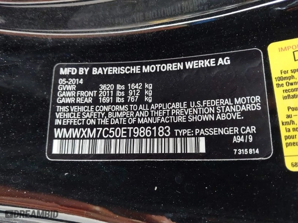 2014 MINI Cooper Hardtop S with VIN WMWXM7C50ET986183, listed as a IAAI auction lot 41719571 with NaN miles. Bid and sale history available at carsss.com. Image 9.