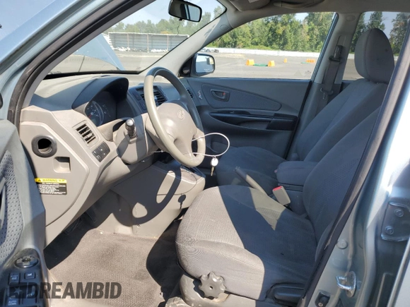 2009 Hyundai Tucson GLS with VIN KM8JM12B29U953176, listed as a Copart auction lot 70141174 with 77,132 mi miles and Salvage Title. Bid and sale history available at carsss.com. Image 7.