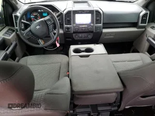 2020 Ford F-150 XL with VIN 1FTEW1CB1LKD56067, listed as a Copart auction lot 87887395 with 106,980 mi miles and Salvage Title. Bid and sale history available at carsss.com. Image 8.