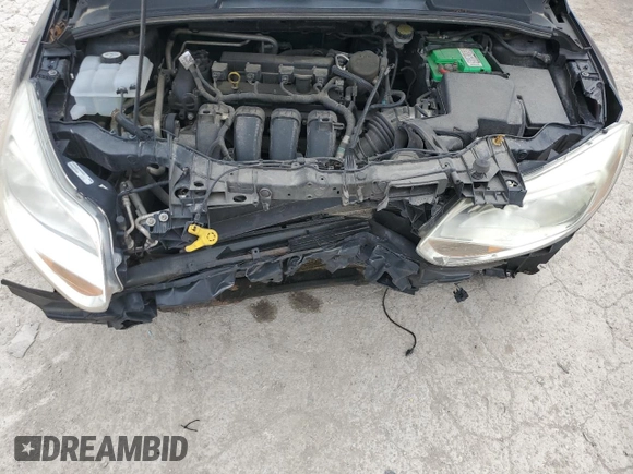 2012 Ford Focus SE with VIN 1FAHP3F25CL170193, listed as a Copart auction lot 58075895 with 180,689 mi miles and Salvage title. Bid and sale history available at DreamBid. Image 11.