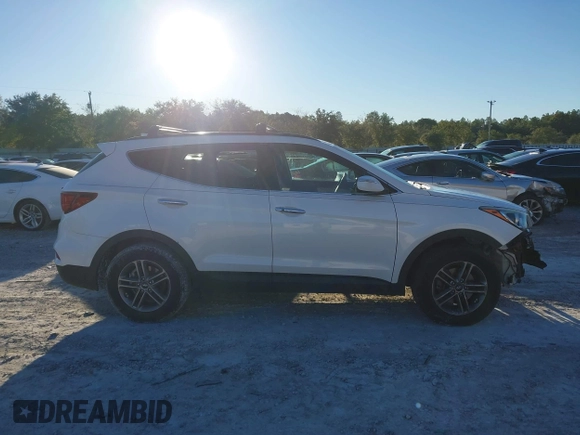 2017 Hyundai Santa Fe 2.4L z VIN 5XYZU3LB4HG435992, wystawiony jako IAAI lot #40927607 z przebiegiem 104 868 mil mil oraz . Historia ofert i sprzedaży dostępna na DreamBid. Obrazek 14.