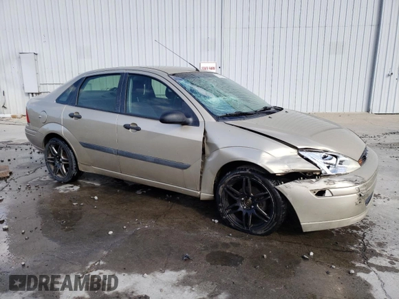 2000 Ford Focus LX with VIN 1FAFP33P8YW381773, listed as a Copart auction lot 80168174 with 151,410 mi miles and Salvage Title. Bid and sale history available at DreamBid. Image 4.