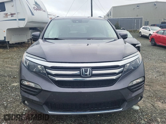 2018 Honda Pilot Touring z VIN 5FNYF6H93JB500695, wystawiony jako Copart lot #83302284 z przebiegiem 12 086 mil mil oraz Szkoda całkowita • Salvage title. Historia ofert i sprzedaży dostępna na DreamBid. Obrazek 5.