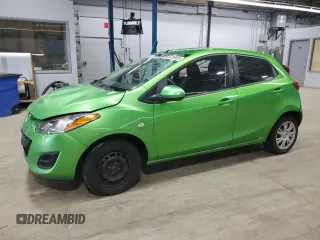2012 Mazda 2 Sport with VIN JM1DE1KY9C0151578, listed as a Copart auction lot 52625055 with 123,812 mi miles and Salvage Title. Bid and sale history available at DreamBid. Image 1.