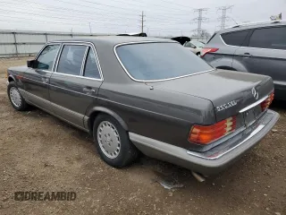 1987 Mercedes-Benz 560 with VIN WDBCA39D7HA322057, listed as a Copart auction lot 83717904 with 246,060 mi miles and Clean Title. Bid and sale history available at DreamBid. Image 2.