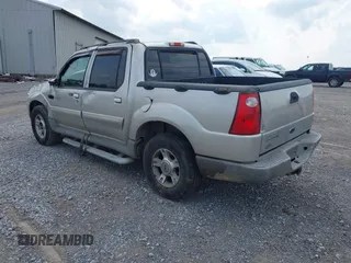 2003 Ford Explorer Sport Trac XLS z VIN 1FMZU77E73UB97392, wystawiony jako IAAI lot #42400398 z przebiegiem 160 556 mil mil oraz . Historia ofert i sprzedaży dostępna na DreamBid. Obrazek 3.