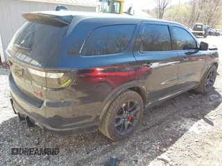 2023 Dodge Durango SRT Hellcat Premium with VIN 1C4SDJH91PC687665, listed as a IAAI auction lot 42070800 with 65,787 mi miles and . Bid and sale history available at carsss.com. Image 4.