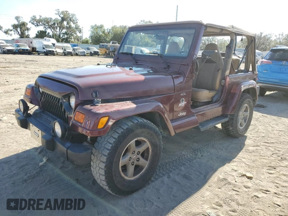 2001 Jeep Wrangler Sahara with VIN 1J4FA59S61P335016, listed as a Copart auction lot 83019614 with 0 mi miles and Salvage Title. Bid and sale history available at carsss.com. Image 1.