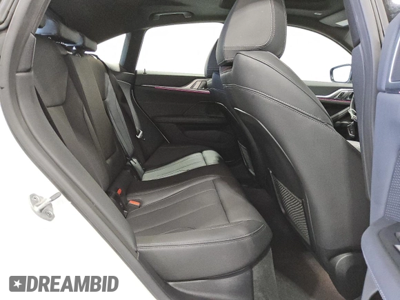 2024 BMW i4 eDrive40 z VIN WBY73AW04RFT37296, wystawiony jako Copart lot #55534975 z przebiegiem 18 786 mil mil oraz Czysty tytuł • Clean title. Historia ofert i sprzedaży dostępna na DreamBid. Obrazek 10.