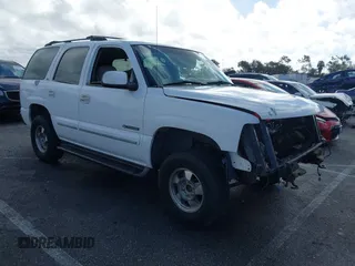 2001 Chevrolet Tahoe LS z VIN 1GNEC13T41R211327, wystawiony jako IAAI lot #41592096 z przebiegiem Nie podano mil oraz . Historia ofert i sprzedaży dostępna na DreamBid. Obrazek 1.
