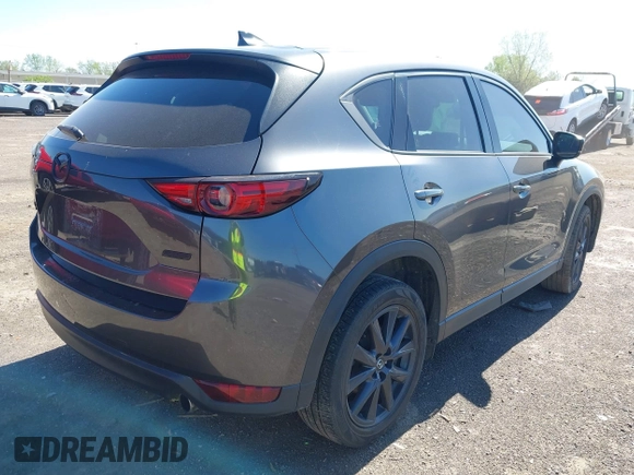 2017 Mazda CX-5 Grand Touring with VIN JM3KFBDLXH0225634, listed as a IAAI auction lot 42092029 with 86,373 mi miles and . Bid and sale history available at carsss.com. Image 4.
