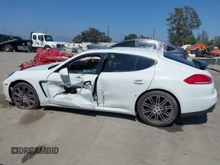 2015 Porsche Panamera 4 z VIN WP0AA2A72FL005751, wystawiony jako IAAI lot #37747010 z przebiegiem 68 128 mil mil oraz . Historia ofert i sprzedaży dostępna na DreamBid. Obrazek 14.
