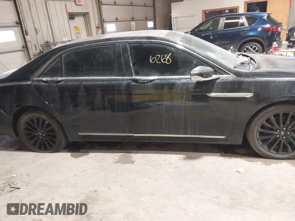 2017 Lincoln Continental with VIN 1LN6L9TP1H5606139, listed as a IAAI auction lot 41566268 with Not Provided miles and . Bid and sale history available at DreamBid. Image 12.