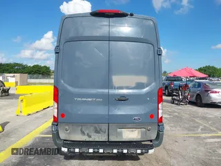 2021 Ford Transit Cargo with VIN 1FTBR3X89MKA54791, listed as a IAAI auction lot 42515449 with 57,847 mi miles and . Bid and sale history available at DreamBid. Image 16.