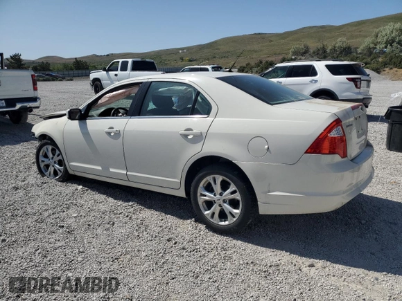 2012 Ford Fusion SE с VIN 3FAHP0HA2CR182256, выставлен на аукционе Copart как лот 57123785 с пробегом 153 988 миль миль и Списание • Salvage title. История ставок и продаж доступна на DreamBid. Изображение 2.
