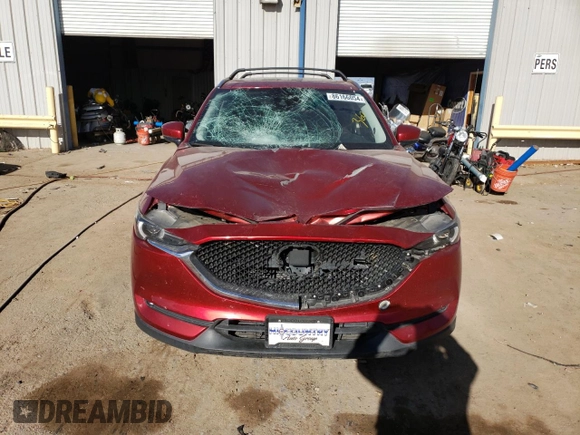 2020 Mazda CX-5 Grand Touring with VIN JM3KFBDM9L1820907, listed as a Copart auction lot 86166054 with 34,007 mi miles and Salvage Title. Bid and sale history available at carsss.com. Image 5.