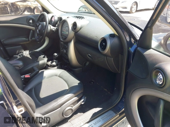 2012 MINI Countryman with VIN WMWZB3C5XCWM06084, listed as a IAAI auction lot 42744454 with 177,231 mi miles and . Bid and sale history available at DreamBid. Image 5.