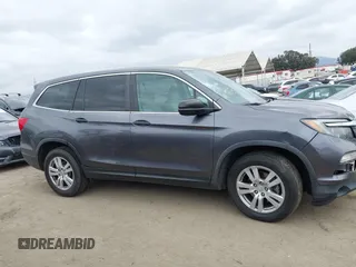 2016 Honda Pilot LX with VIN 5FNYF5H14GB037205, listed as a IAAI auction lot 42034018 with 101,943 mi miles and . Bid and sale history available at DreamBid. Image 13.