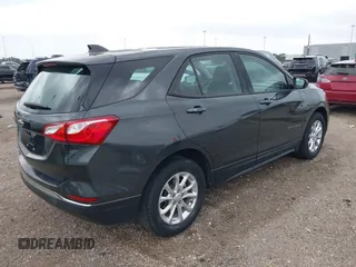 2018 Chevrolet Equinox LS with VIN 3GNAXHEV0JS506562, listed as a IAAI auction lot 41925572 with 97,031 mi miles and . Bid and sale history available at DreamBid. Image 4.