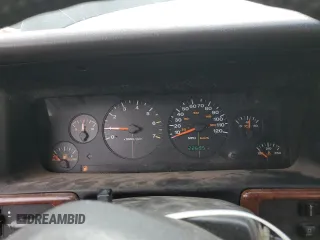 1996 Jeep Grand Cherokee with VIN 1J4EZ58S8TC106529, listed as a Copart auction lot 50163965 with 226,951 mi miles and Salvage title. Bid and sale history available at DreamBid. Image 9.