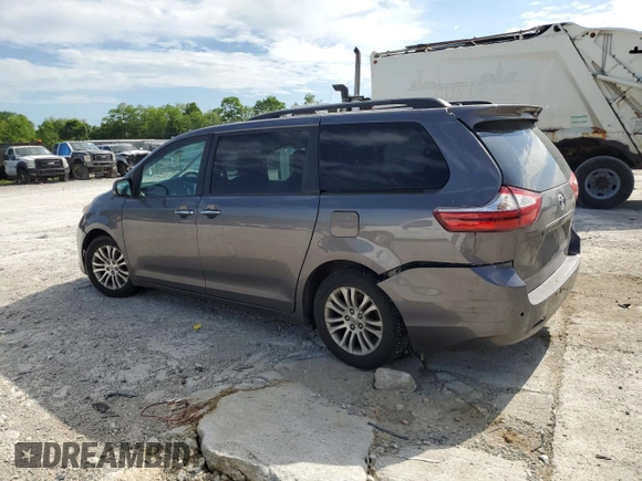 2015 Toyota Sienna XLE with VIN 5TDYK3DC5FS643985, listed as a Copart auction lot 56956505 with 179,131 mi miles and Salvage title. Bid and sale history available at DreamBid. Image 2.