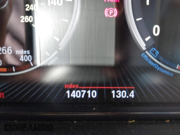 2013 BMW 5 Series 528i xDrive with VIN WBAXH5C50DDW12545, listed as a IAAI auction lot 42139257 with 140,710 mi miles and . Bid and sale history available at carsss.com. Image 7.