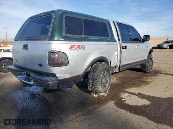 2002 Ford F-150 XLT with VIN 1FTRW08L12KA86849, listed as a Copart auction lot 77861574 with 0 mi miles and Salvage Title. Bid and sale history available at carsss.com. Image 3.