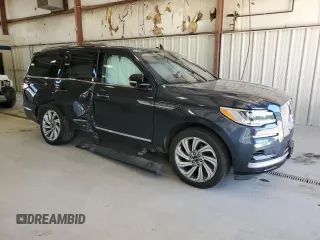 2022 Lincoln Navigator Reserve z VIN 5LMJJ2LT8NEL04053, wystawiony jako Copart lot #57211255 z przebiegiem Nie podano mil oraz Szkoda całkowita • Salvage title. Historia ofert i sprzedaży dostępna na DreamBid. Obrazek 4.