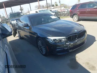 2018 BMW 5 Series 540i xDrive with VIN WBAJE7C59JWC57484, listed as a IAAI auction lot 41630043 with 86,892 mi miles and . Bid and sale history available at DreamBid. Image 1.