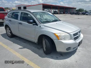 2008 Dodge Caliber SE with VIN 1B3HB28B98D757953, listed as a IAAI auction lot 42111663 with 115,977 mi miles. Bid and sale history available at carsss.com. Image 1.