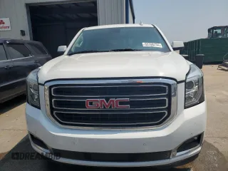 2020 GMC Yukon SLT with VIN 1GKS1BKC0LR243224, listed as a Copart auction lot 65768234 with 129,702 mi miles and Salvage Title. Bid and sale history available at DreamBid. Image 5.