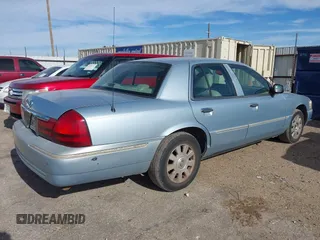 2005 Mercury Grand Marquis LS Premium z VIN 2MEFM75W75X664470, wystawiony jako IAAI lot #41960637 z przebiegiem 191 600 mil mil oraz . Historia ofert i sprzedaży dostępna na DreamBid. Obrazek 4.