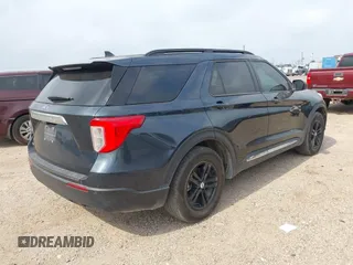 2023 Ford Explorer XLT with VIN 1FMSK7DH9PGB87649, listed as a IAAI auction lot 42271454 with 26,860 mi miles and . Bid and sale history available at DreamBid. Image 4.