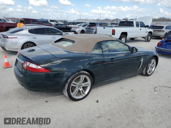2007 Jaguar XK with VIN SAJWA44C779B12243, listed as a Copart auction lot 77239534 with Not Provided miles and Salvage Title. Bid and sale history available at carsss.com. Image 3.