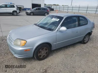 2005 Hyundai Accent GLS with VIN KMHCG35C55U341192, listed as a Copart auction lot 70708994 with 174,872 mi miles and Salvage Title. Bid and sale history available at carsss.com. Image 1.